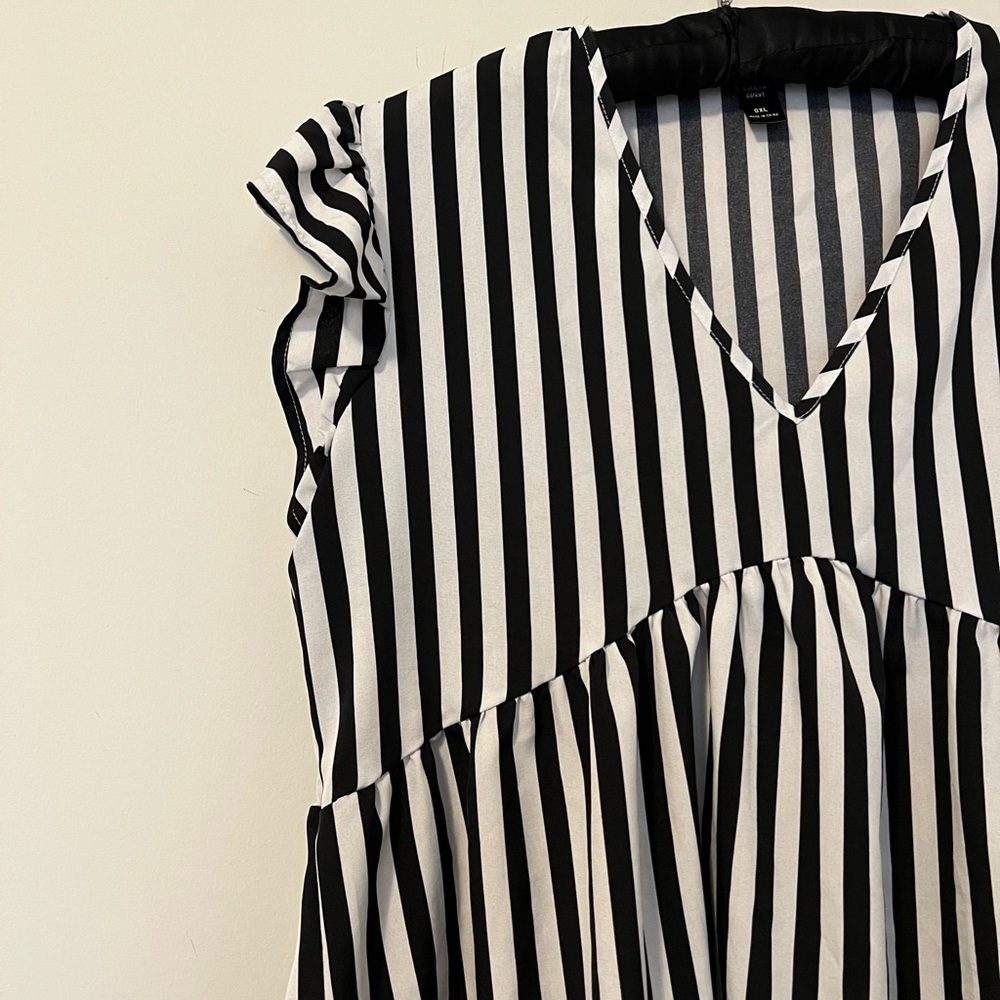Ruffle sleeve striped shirt.
